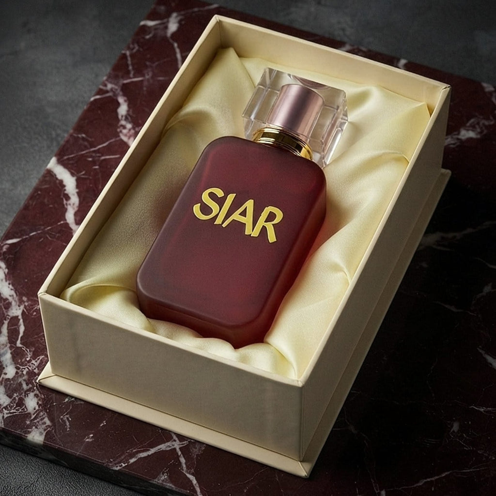 Siar Official SIAR Velvet perfume bottle laid inside its box, showcasing elegant packaging and luxurious design.