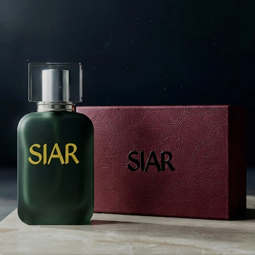 SIAR Noir perfume bottle from Siar Official standing in front of its box, showcasing sleek black design and elegant packaging.